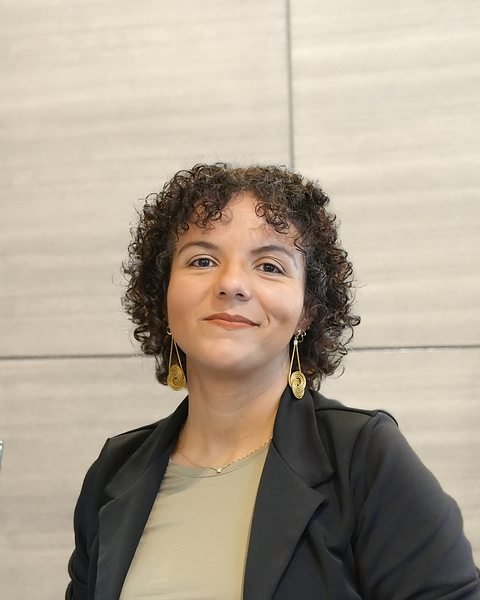 Raquel Camargo smiling at the camera
